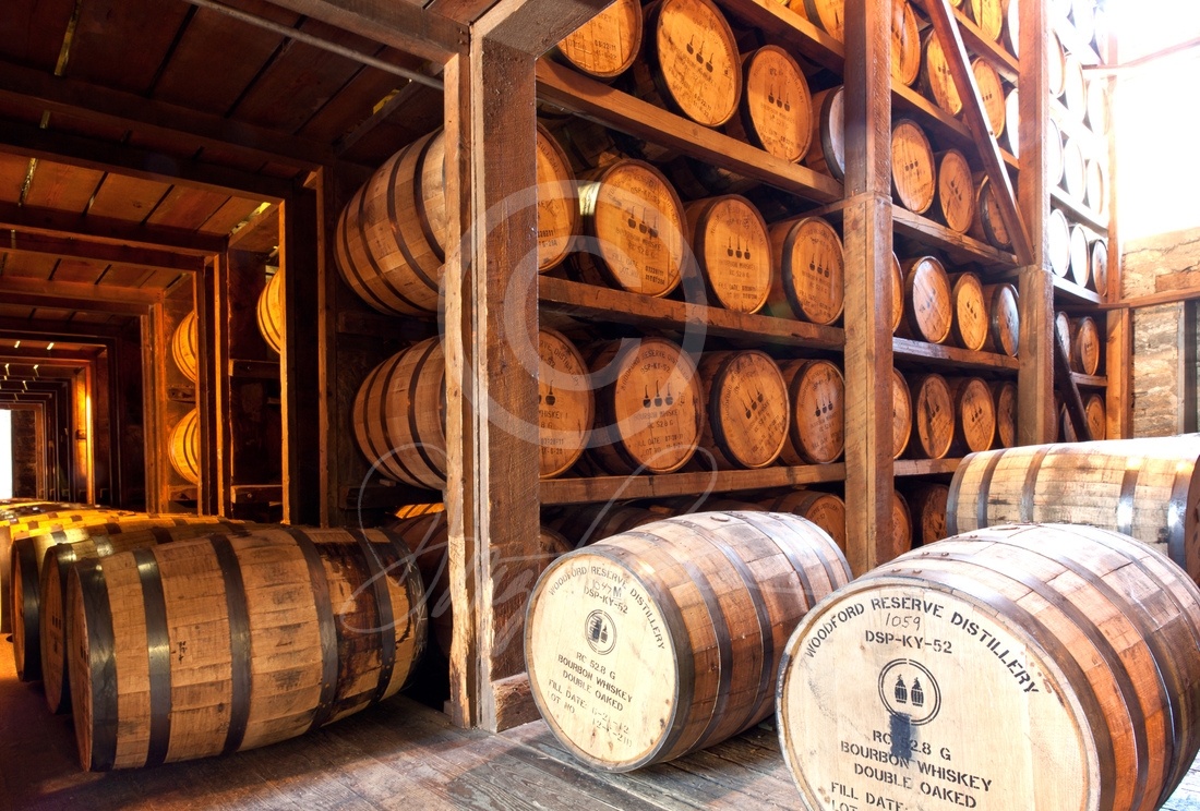 A fine art bourbon whiskey print, Bourbon barrels aging in their wooden ricks, or racks, in warehouses all throughout Kentucky, show here at the Woodford Reserve Distillery in Woodford County. Photograph by Doug Prather