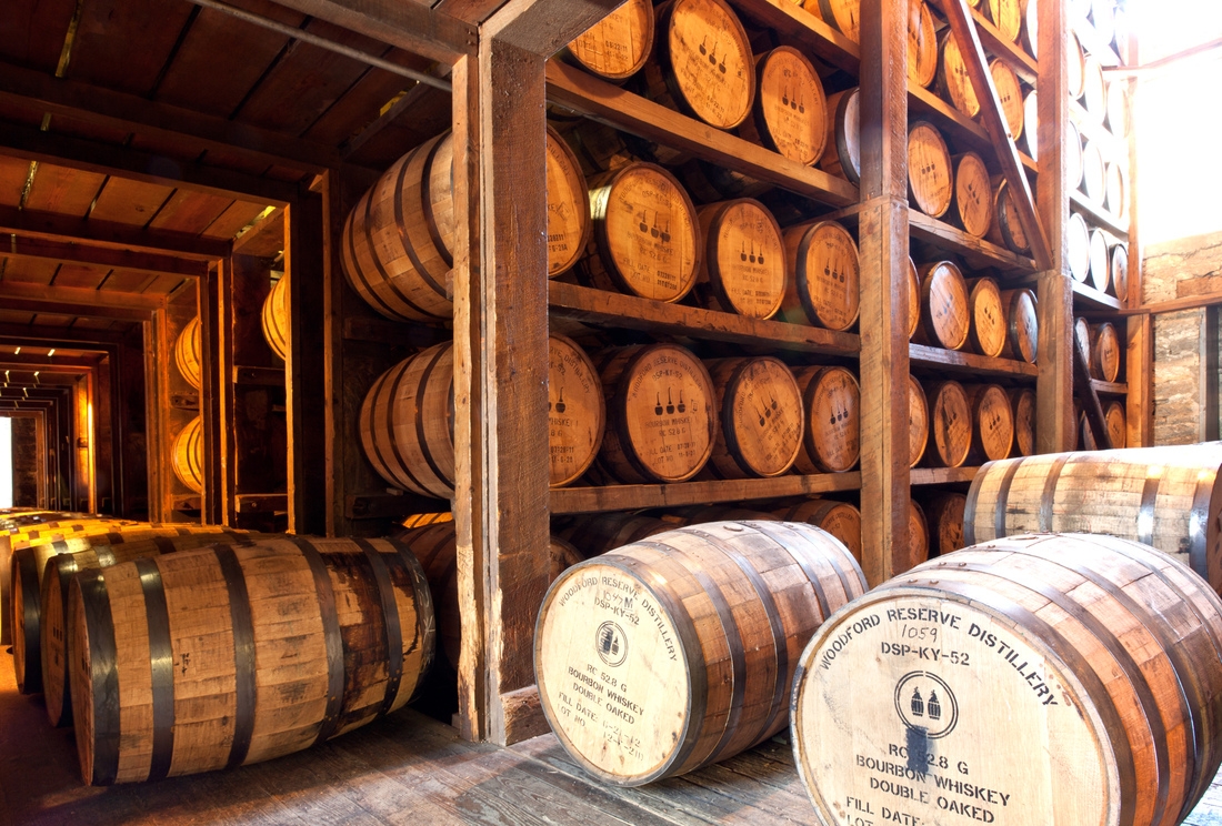 A fine art bourbon whiskey print, Bourbon barrels aging in their wooden ricks, or racks, in warehouses all throughout Kentucky, show here at the Woodford Reserve Distillery in Woodford County. Photograph by Doug Prather