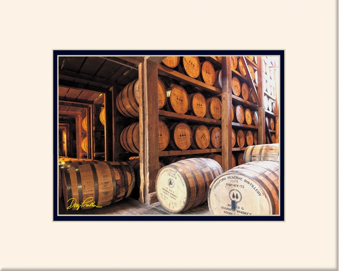 A fine art bourbon whiskey print, Bourbon barrels aging in their wooden ricks, or racks, in warehouses all throughout Kentucky, show here at the Woodford Reserve Distillery in Woodford County. Photograph by Doug Prather